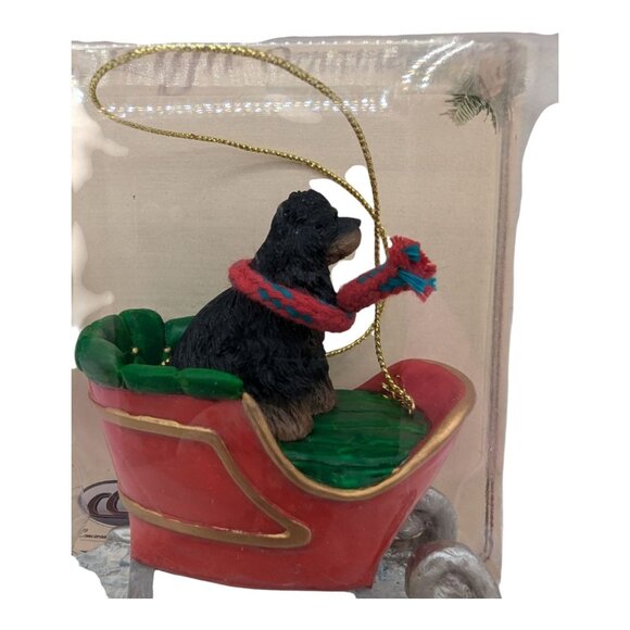Conversation Concepts Black & Brown Cocker Spaniel Sleigh Christmas Ornament - Picture 2 of 5